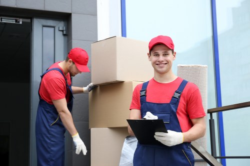 Van loading safely with protective moving equipment