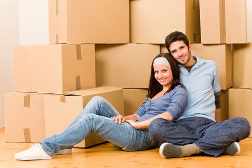 Packed office boxes and furniture ready for transport