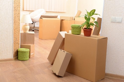 Packed household boxes loaded into a removals van